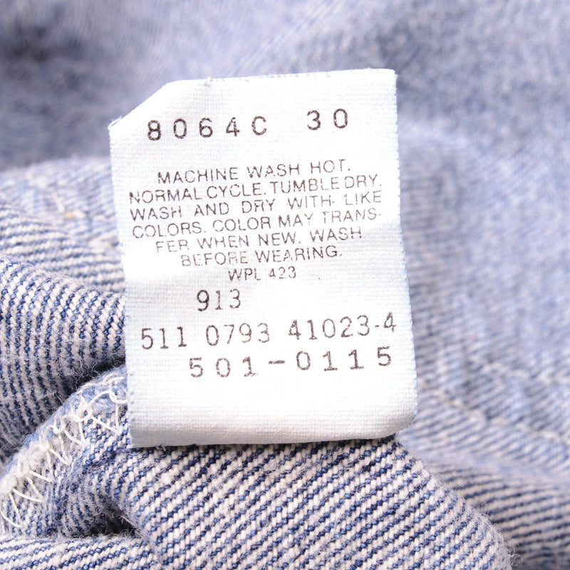 Beautiful Indigo Levis 501 Jeans Made in USA with a medium blue wash, some nice contrast between light and medium blue and some very light whiskers.  Size on Tag 40X34  ACTUAL SIZE 38X32  Back Button #511