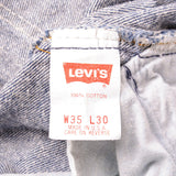 Beautiful Indigo Levis 501 Jeans 1990's Made in USA with a dark wash.  Size on Tag 35X30  ACTUAL SIZE 33X29  Back Button #553