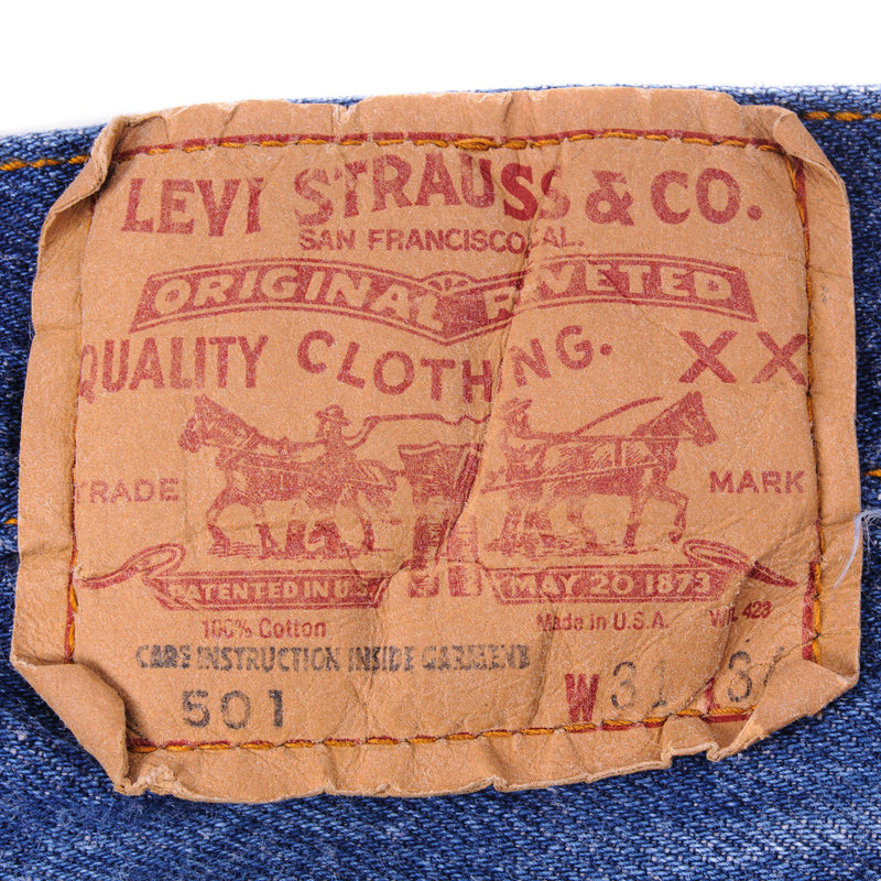 Beautiful Indigo Levis 501 jeans Made in USA with Medium Dark Size on Tag 31X34 Real Size 29x30
