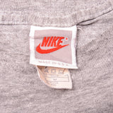 Vintage Nike Big Swoosh Logo Tee Shirt 1987-1994 Size M Made In USA with single stitch sleeves.
