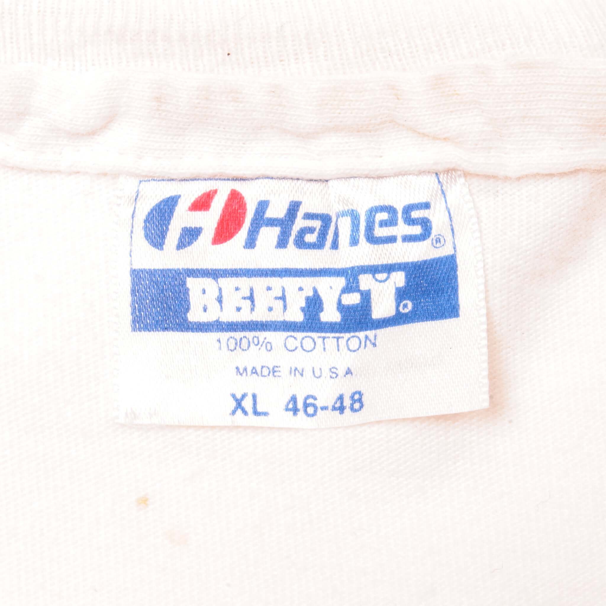 Vintage Animal Print Earth Day National Wildlife Federation Hanes Tee Shirt 1990 Size Large Made In USA with single stitches sleeves.