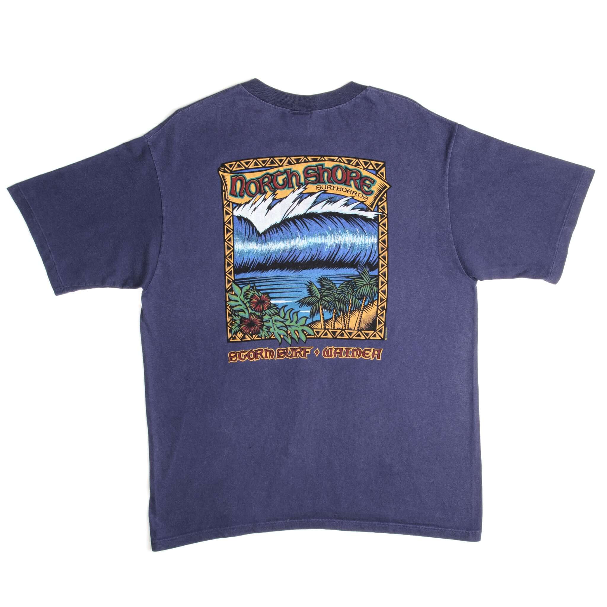 Vintage North Shore Built To Shred Surfboards Storm Surf Waimea Crazy Shirt Hawaii Tee Shirt 1990s Size X-Large Made In USA With Single Stitch Sleeves.