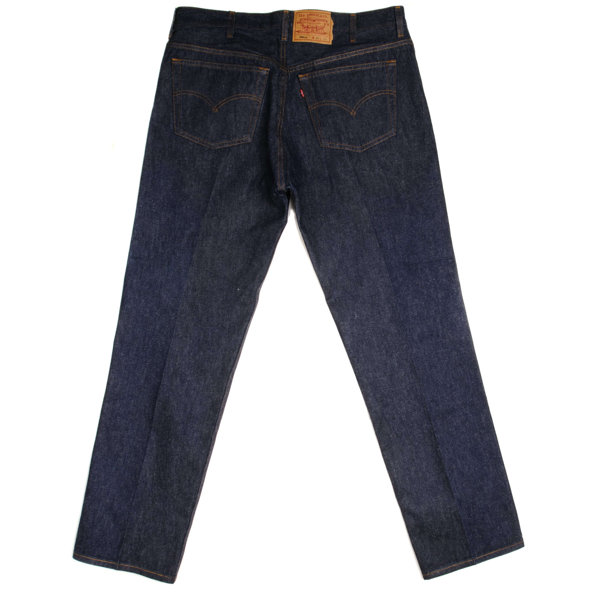 Beautiful Indigo Levis 501 Jeans 1990s Made in USA with a very dark wash.  Size on Tag 40X34  ACTUAL SIZE 38X32  Back Button #552